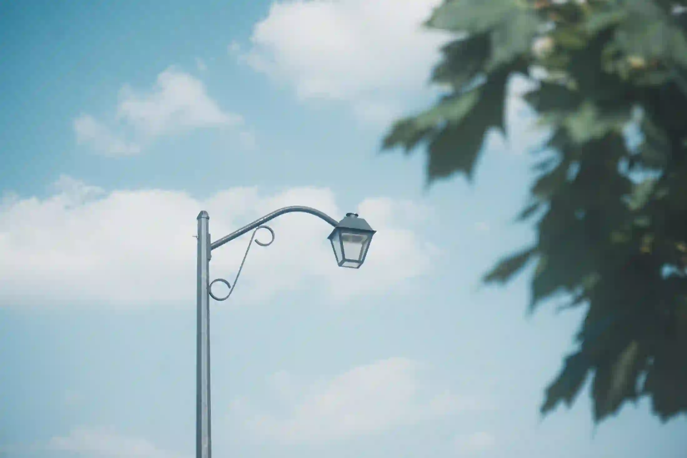 An ornamental lamp post against the sky on a Bradford street