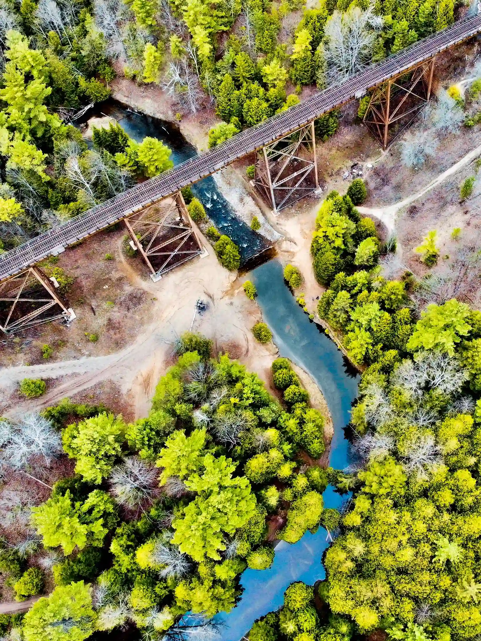 Aerial view of an old rail trestle over a creek in Bradford West Gwillimbury