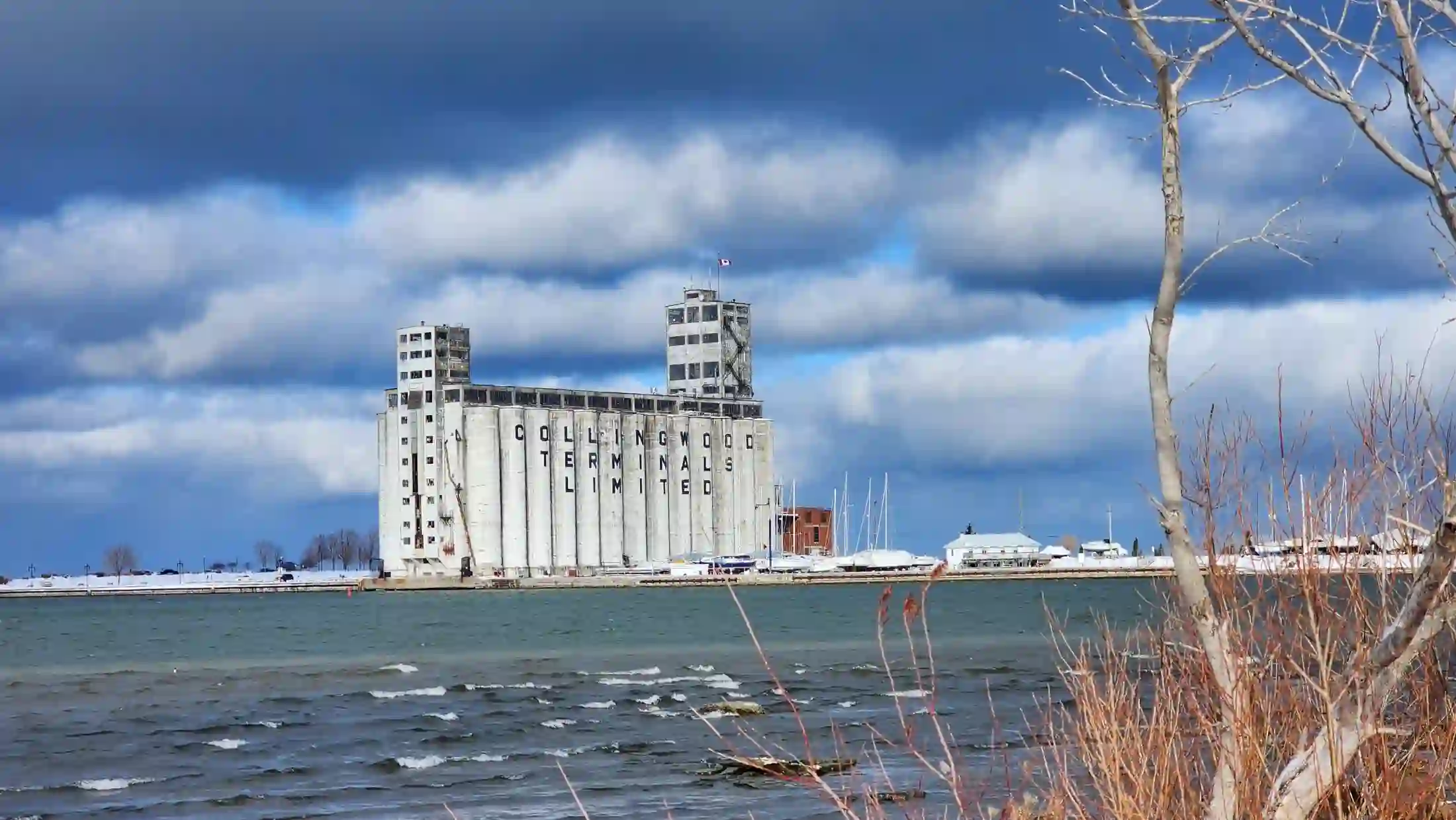 Collingwood's historic grain terminals seen across the bay in winter