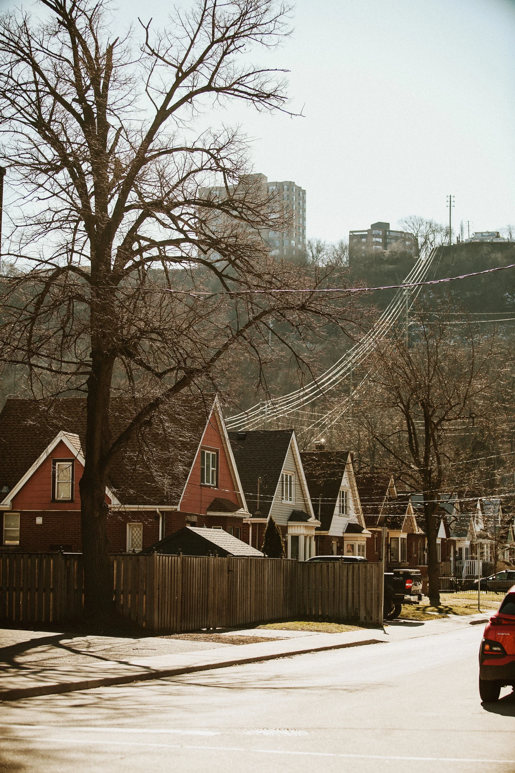 A residential Hamilton street climbing toward the escarpment