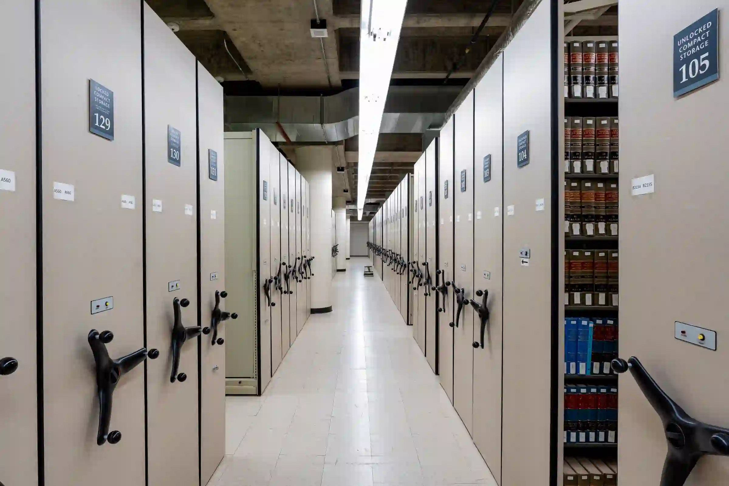 Rows of legal records and archive shelving in a modern storage facility