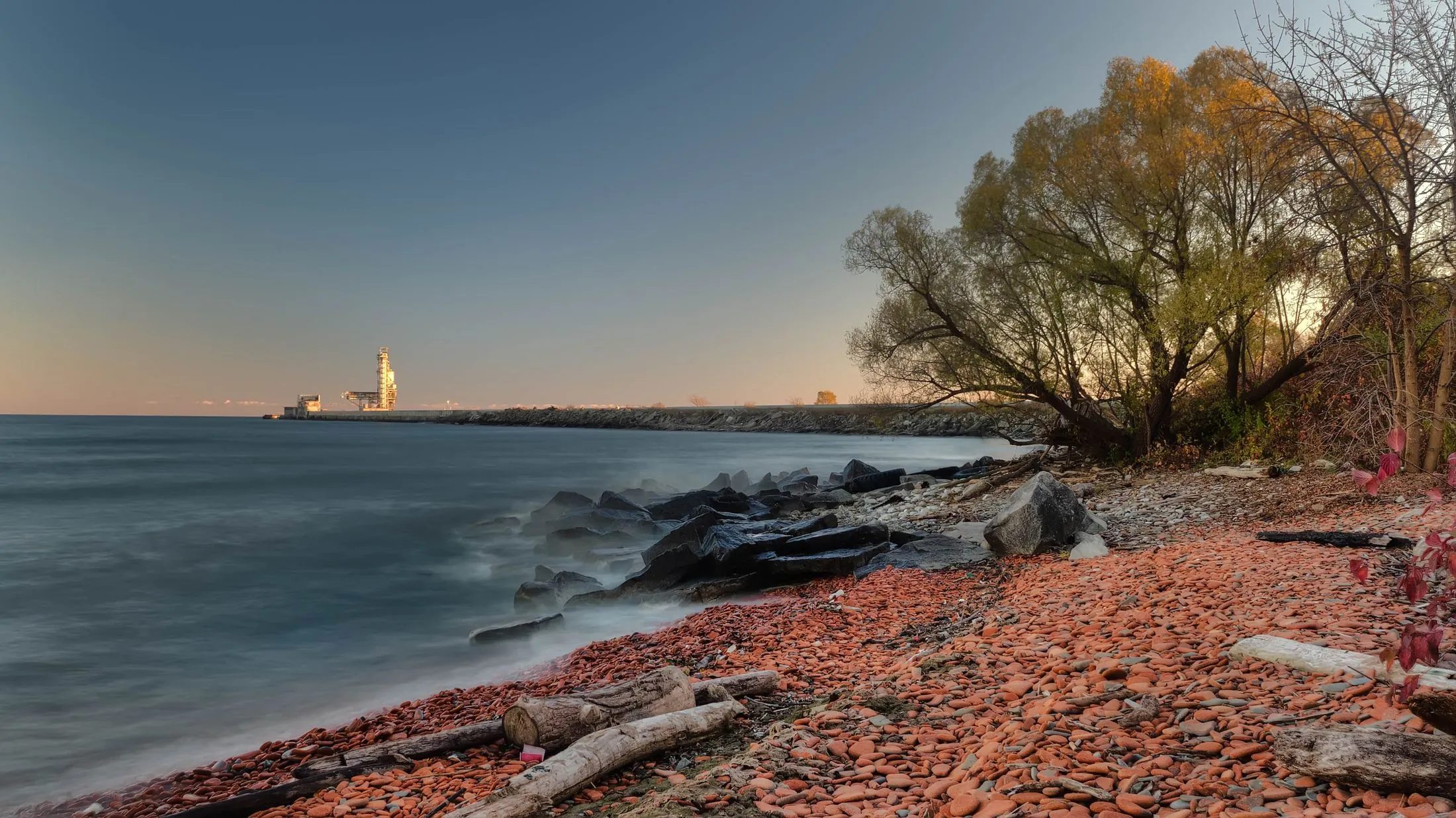 The rocky Lake Ontario shoreline in Mississauga at sunset