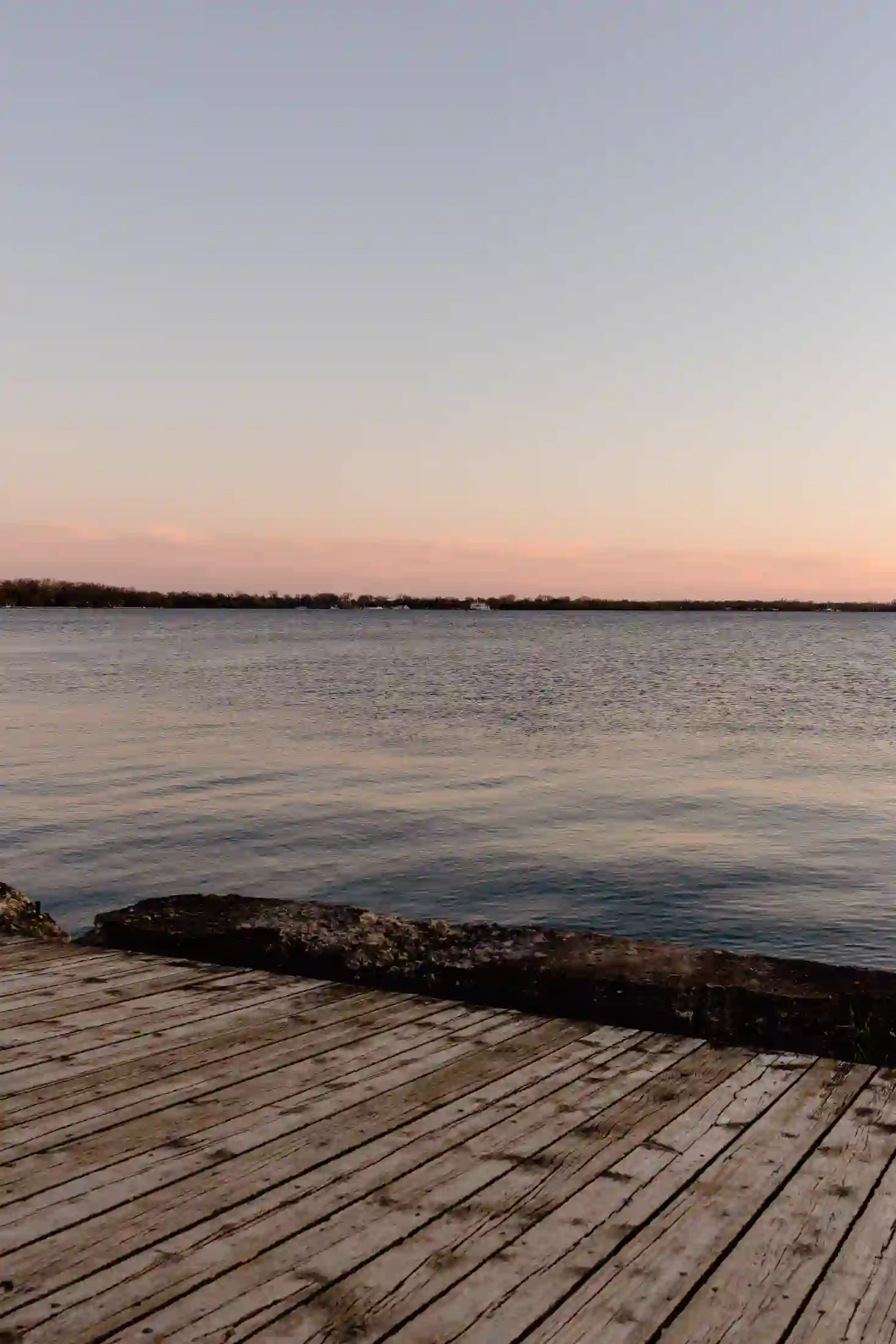 A quiet dock at sunset on the water near Orillia
